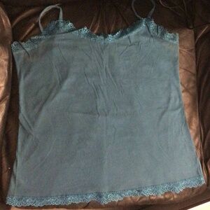 Teal camisole with lace accent along hem and neck